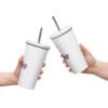 Two hands holding up cups with straws in them.