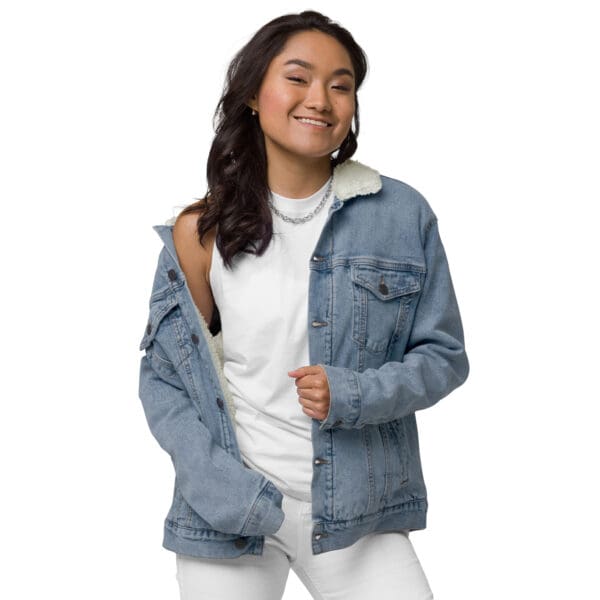 A woman in white shirt and blue jacket